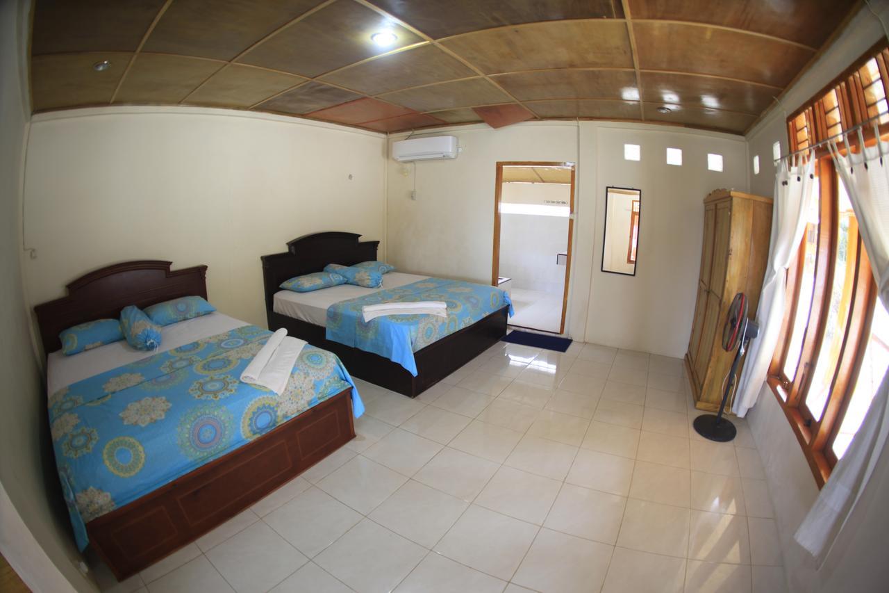 Puri Asu Resort Palau Asu Екстериор снимка