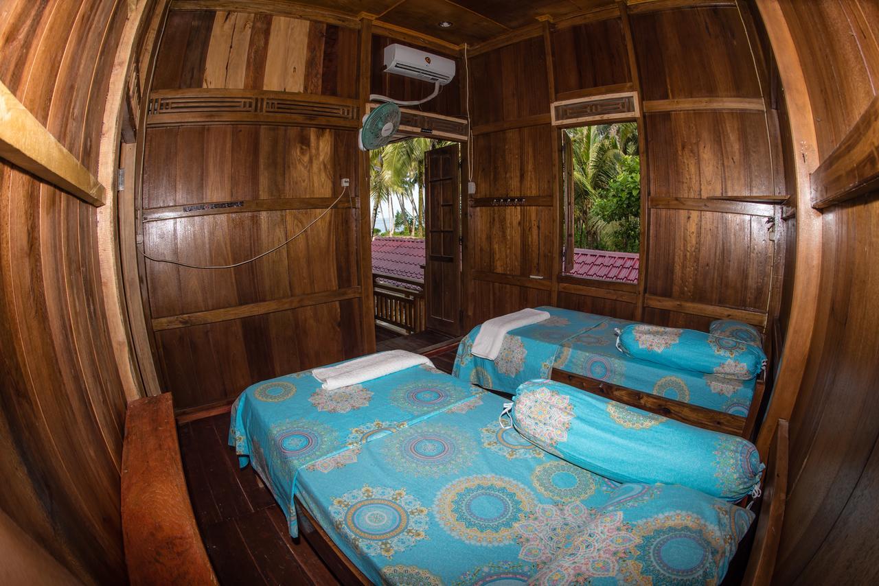 Puri Asu Resort Palau Asu Екстериор снимка