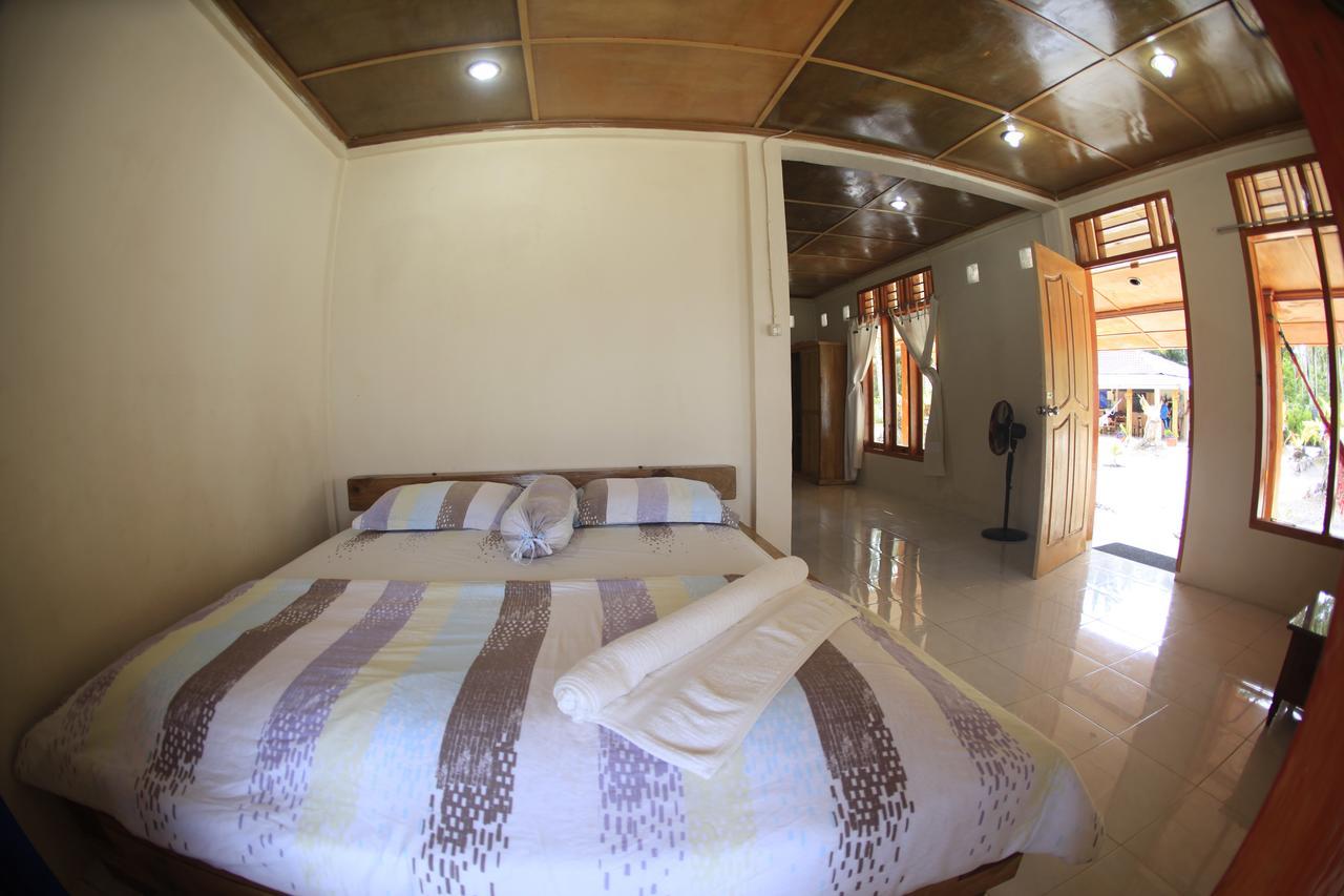 Puri Asu Resort Palau Asu Екстериор снимка